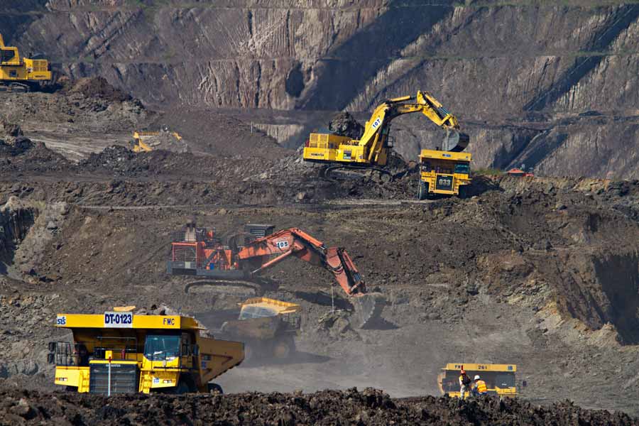 Diggers mining the side of a hill